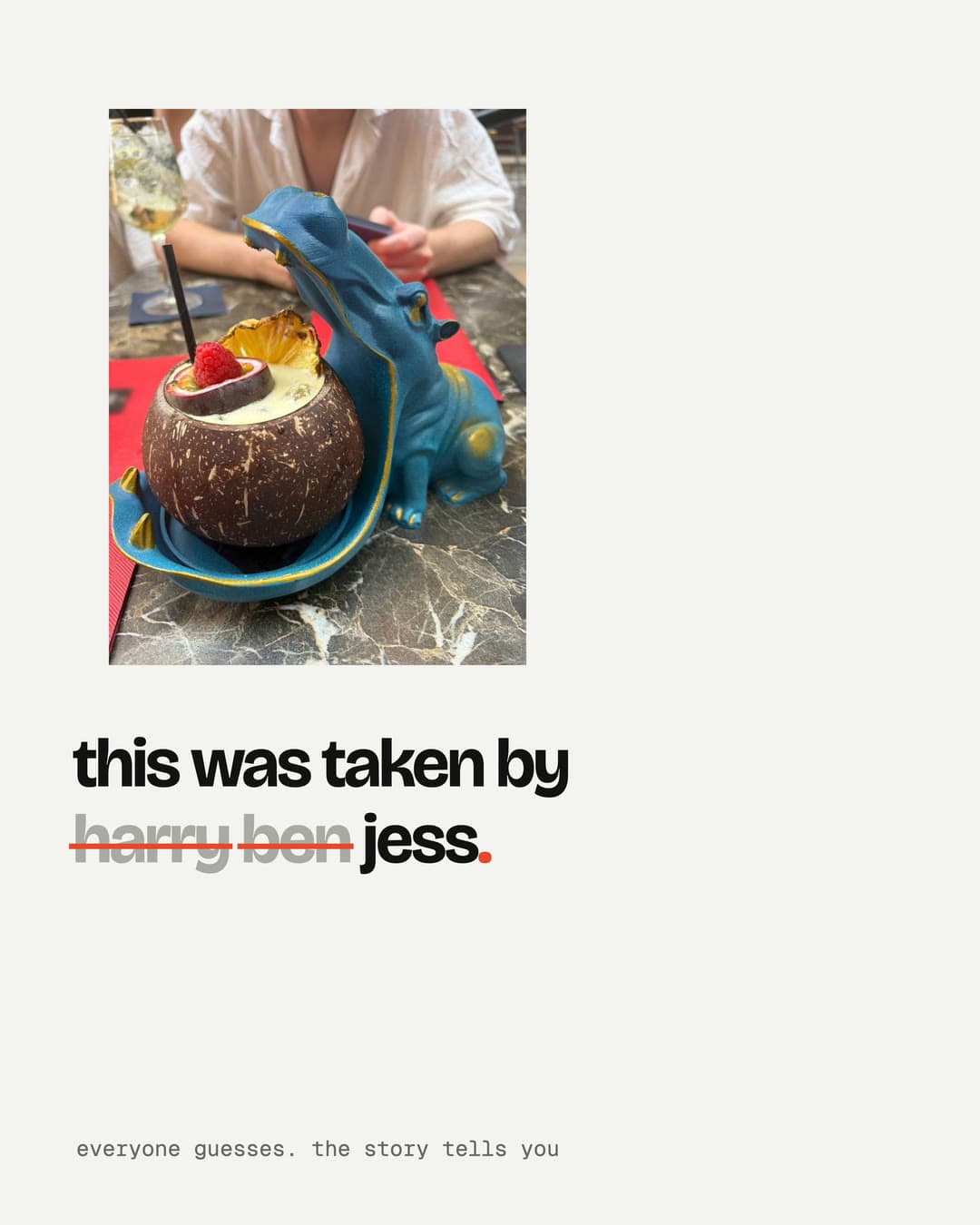 A cocktail served in a coconut, captioned 'this was taken by harry ben jess.' with harry and ben struck through.